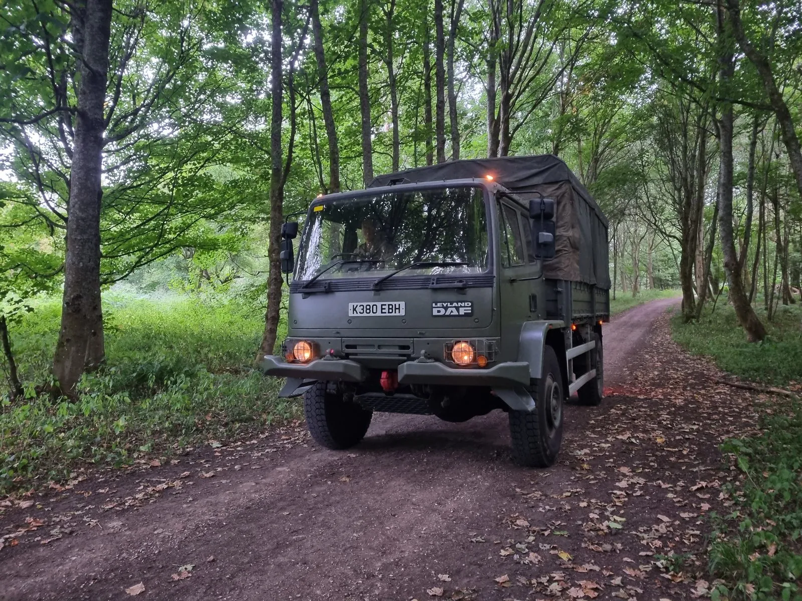 Ex-military truck on a woodland track